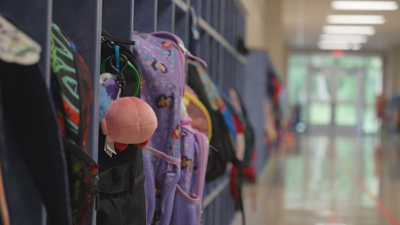 A row of students' backpacks at a school in Minnesota