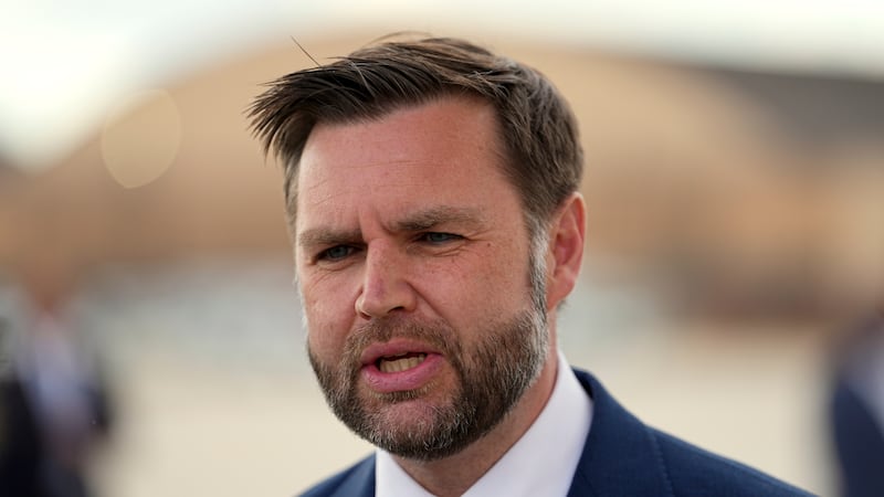 Vice President JD Vance speaks with reporters upon arriving on Air Force Two at Joint Base...