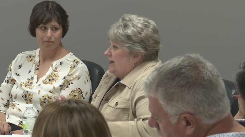 A resident speaking at a meeting at Shared Spaces in Mankato, Minn.