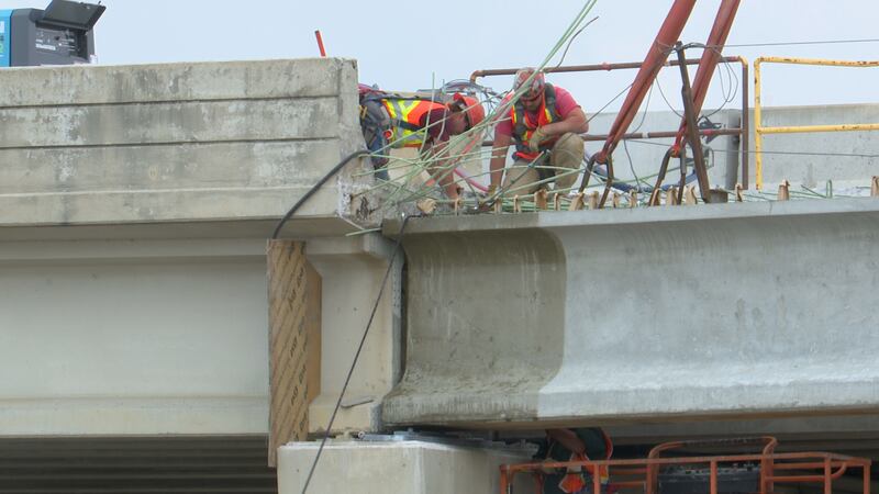 Work on the Highway 14 bridge over 22 continues. The new pieces were installed and crews are...