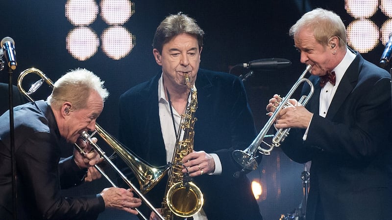 Walter Parazaider (center) performs with Chicago at the 31st Annual Rock and Roll Hall of Fame...