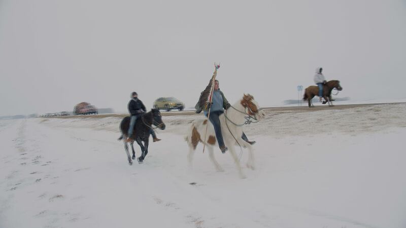 Makahto Reconciliation Riders on horseback near New Ulm, Minn.