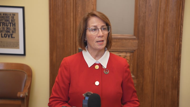 Minnesota Senate Majority Leader Erin Murphy speaks to the media following a Senate floor session
